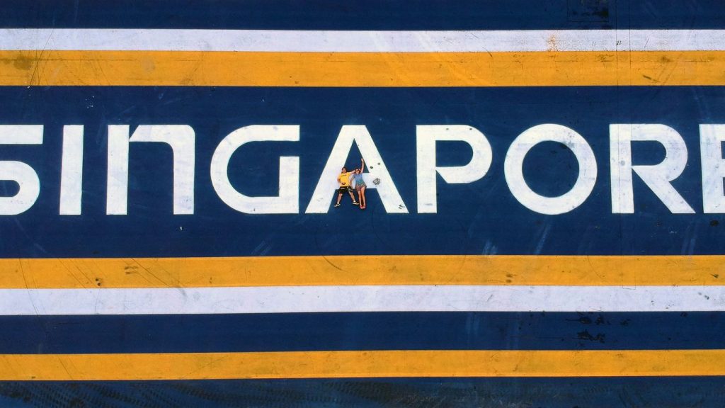 a close up of a sign on the side of a building