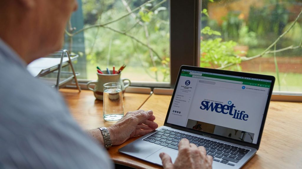 A man is working on his laptop.