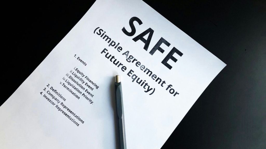 a pen sitting on top of a piece of paper