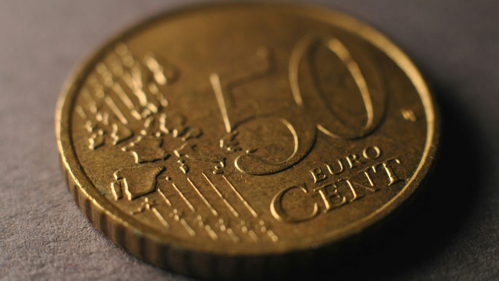 A close up of a coin on a table