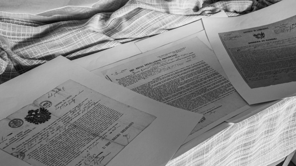 a book open on a bed