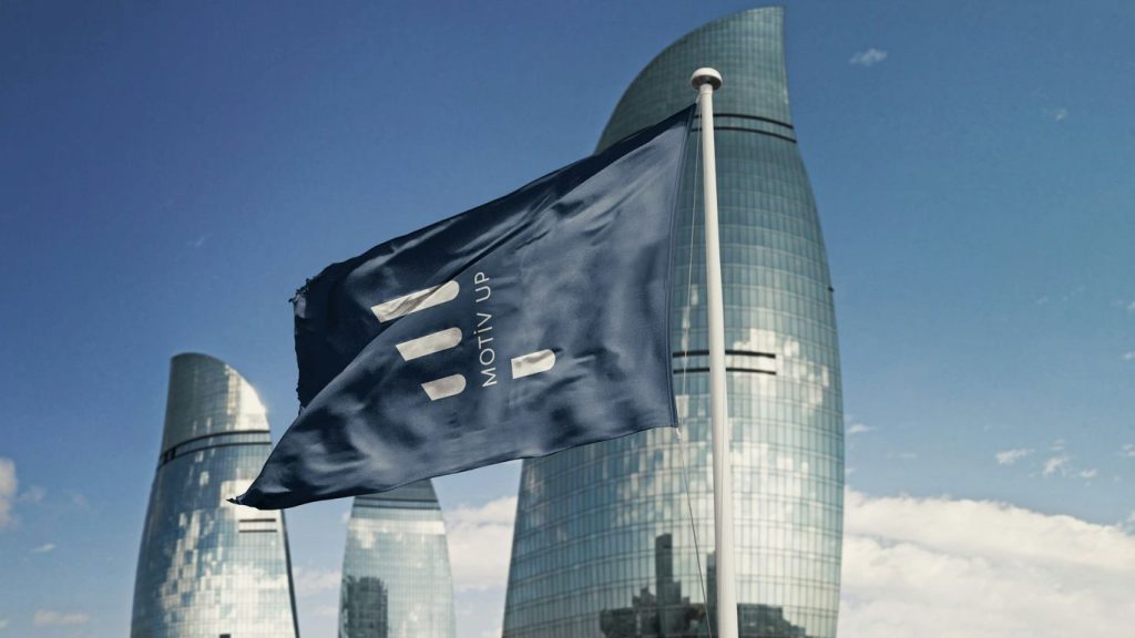 blue and white flag on pole during daytime