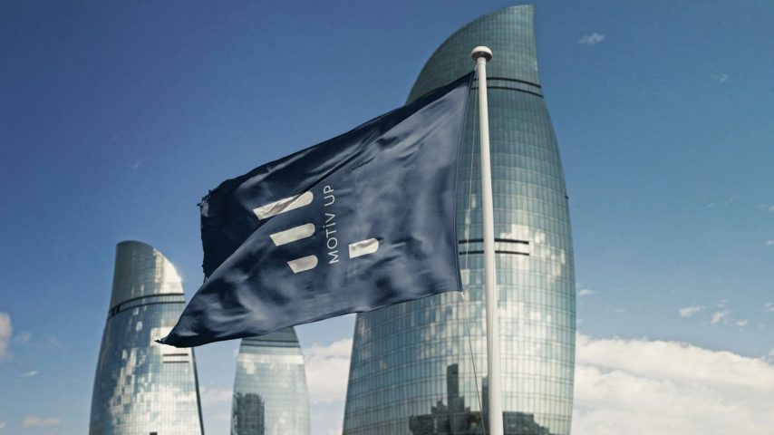 blue and white flag on pole during daytime